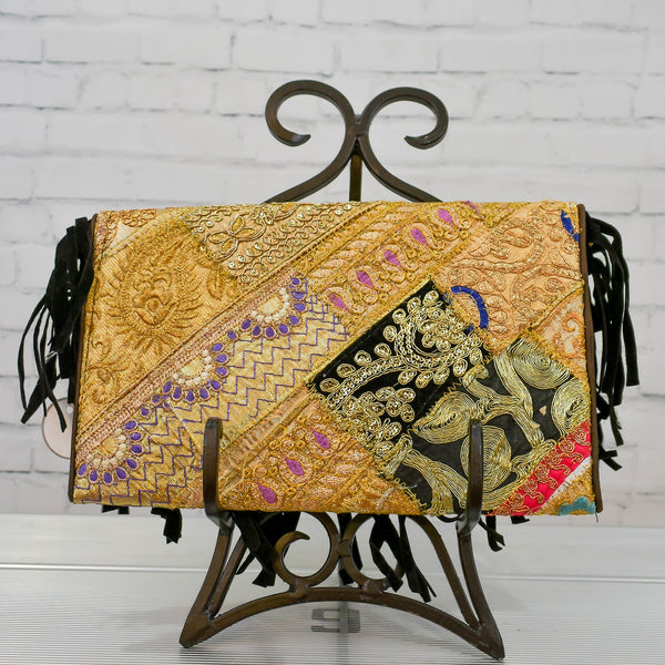 Golden toned clutch/crossbody purse